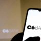 C6 Bank, banco digital, OFERRECE conta global quem quer investir no exterior